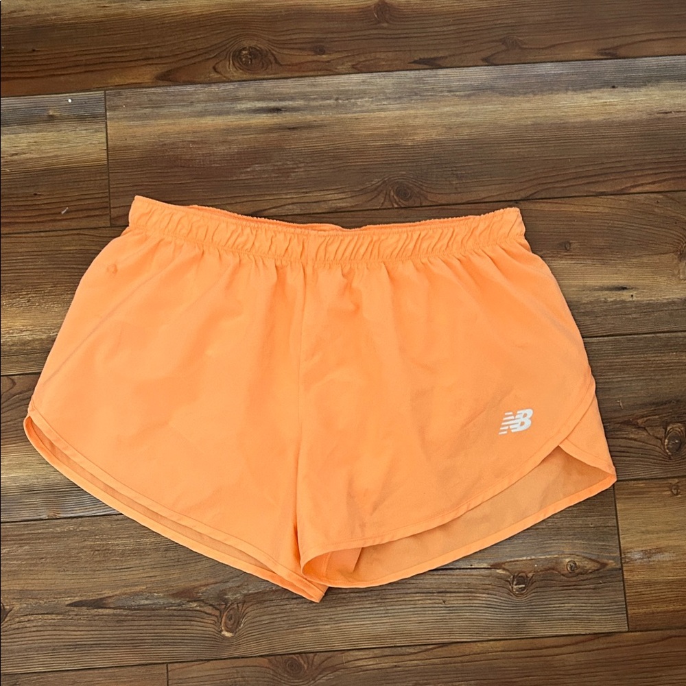 New Balance Women's Bright Orange Athletic Shorts